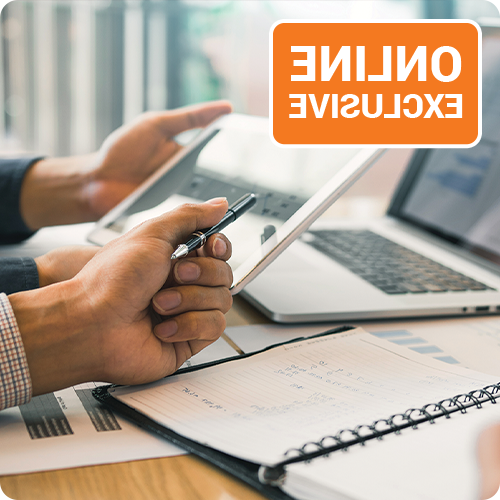 two people working in front of laptops